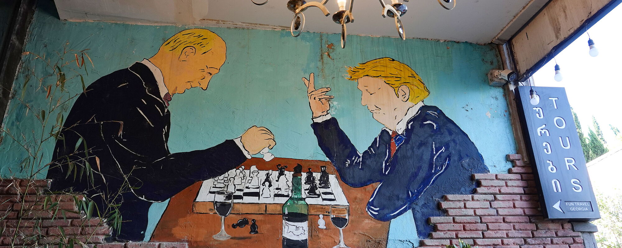 Trump and Putin playing Chess
