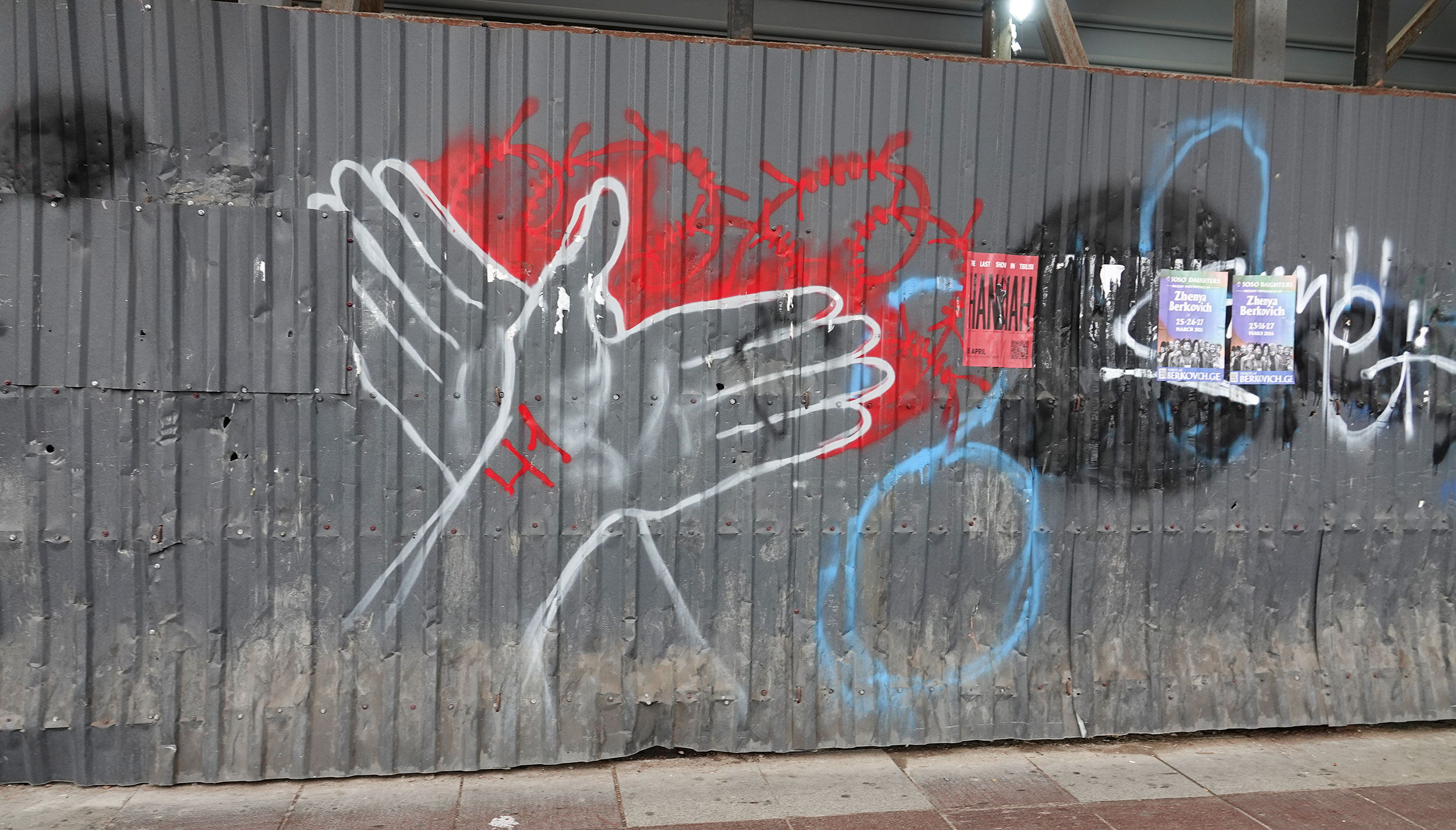 Hands against the Wire Fence